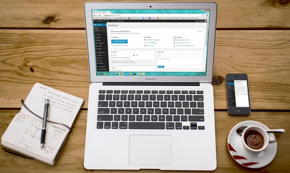 Laptop on desk with WordPress website